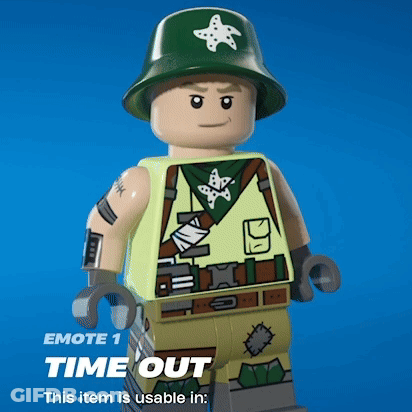 A Lego Man With A Green Helmet And A Star On His Hat GIF