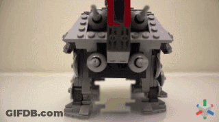 A Lego Robot With A Red Stripe On The Front GIF