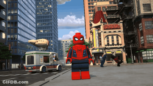 A Lego Spider Man Stands On A City Street With A Pizza Truck In The Background GIF