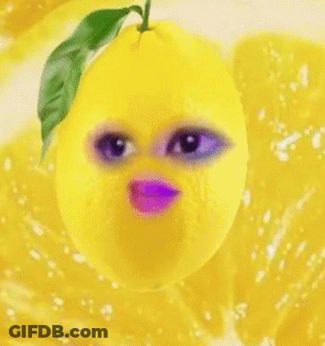 A Lemon With A Purple Mouth And Eyes GIF