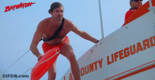 A Lifeguard Is Standing On A Boat That Says Bounty Lifeguard On It GIF