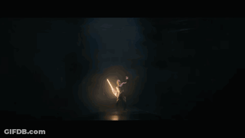 A Lightning Bolt Strikes A Person In A Dark Cave GIF