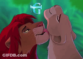 A Lion And A Lioness Are Kissing Each Other In A Cartoon . GIF