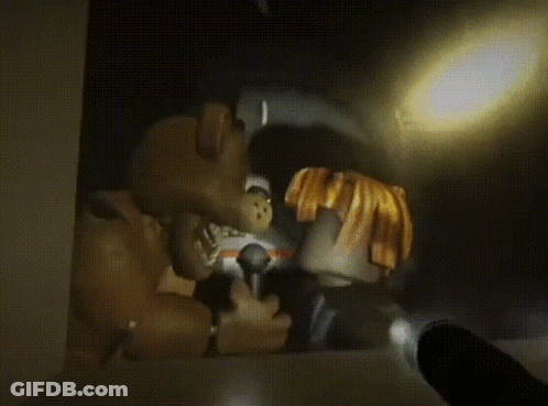 A Lion And A Monkey Looking At Each Other With Their Mouths Open GIF