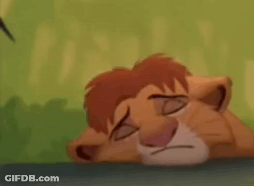 A Lion From The Lion King Is Laying Down With His Eyes Closed And A Bird Flying In The Background . GIF