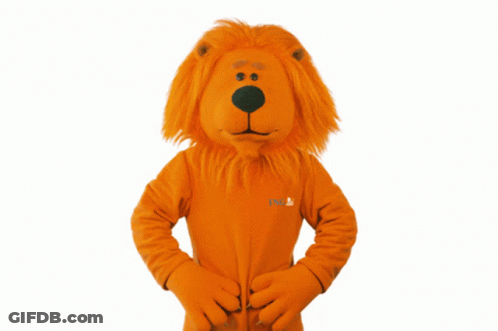 A Lion Mascot Is Wearing A Shirt That Says ' Nl ' On It GIF