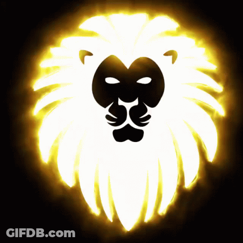 A Lion 'S Head Is Glowing In The Dark With A White Mane GIF