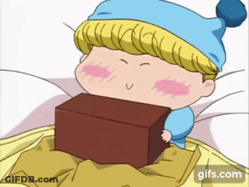 A Little Boy In A Blue Hat Is Holding A Box In His Hand GIF
