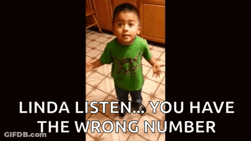 A Little Boy In A Green Shirt Is Crying While Standing On A Tile Floor . GIF