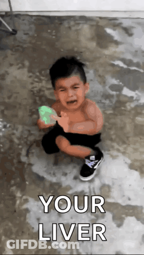 A Little Boy Is Crying While Holding A Water Balloon With The Words " Your Liver " On The Bottom GIF