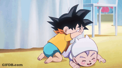 A Little Boy Is Playing With A Baby In A Diaper GIF
