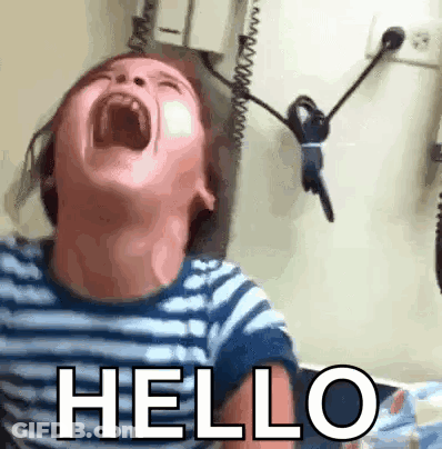 A Little Boy Is Screaming With His Mouth Open And The Words Hello Written On The Bottom Of His Face . GIF