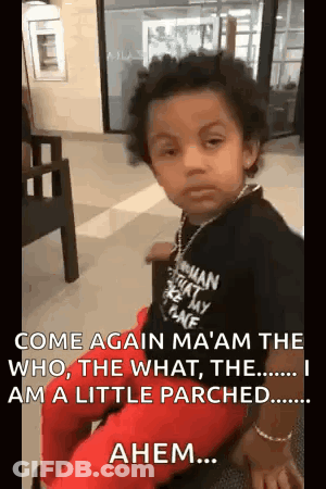 A Little Boy Is Sitting On A Chair In A Waiting Room . GIF