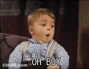 A Little Boy Is Sitting On A Couch Making A Surprised Face And Saying Oh Boy . GIF