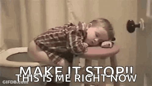 A Little Boy Is Sleeping On A Stool In Front Of A Toilet . GIF