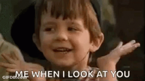 A Little Boy Is Smiling And Saying `` Me When I Look At You '' With His Hands Outstretched . GIF