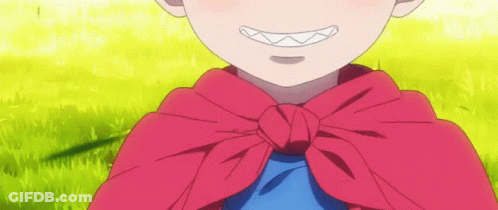 A Little Boy Wearing A Red Cape And A Blue Shirt Is Smiling . GIF