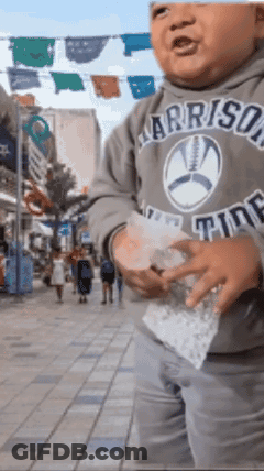 A Little Boy Wearing A Sweatshirt That Says " Arrison " On It GIF