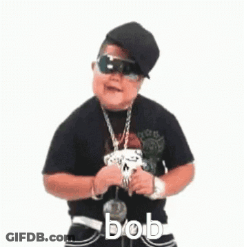 A Little Boy Wearing Sunglasses , A Hat , A Necklace And A Skull Necklace Is Dancing . GIF