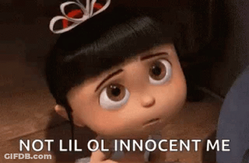 A Little Girl From Despicable Me Is Sitting On The Floor With A Bow In Her Hair . GIF