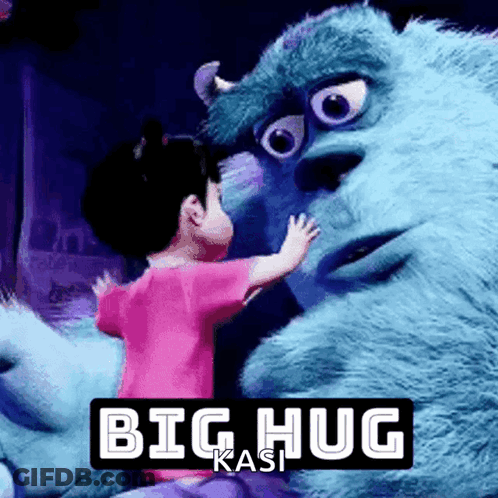 A Little Girl Hugging A Monster From Monsters Inc GIF