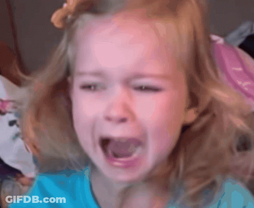 A Little Girl In A Blue Shirt Is Crying GIF