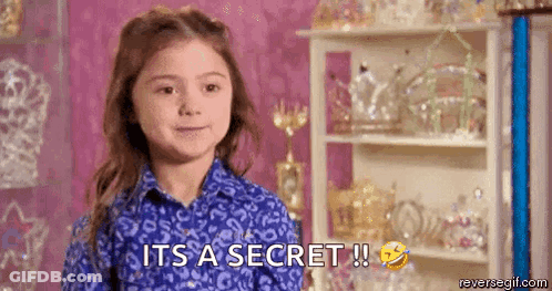 A Little Girl In A Blue Shirt Is Saying `` It 'S A Secret '' . GIF