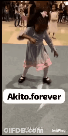 A Little Girl In A Dress Is Dancing On A Dance Floor With A Sign That Says Akito Forever . GIF