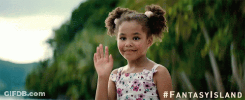 A Little Girl In A Floral Dress Is Waving Her Hand In Front Of A Fantasy Island Logo GIF