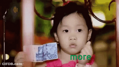 A Little Girl In A Pink Dress Is Holding Up A 5000 Rupiah Bill GIF