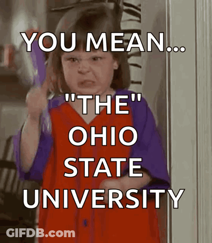 A Little Girl In A Red And Purple Dress Is Holding A Toothbrush And Says " You Mean " GIF