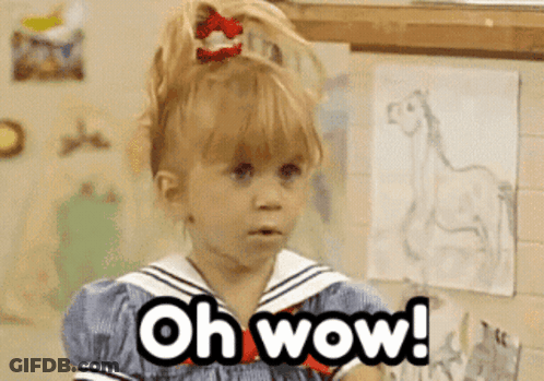 A Little Girl In A Sailor Outfit Is Making A Surprised Face And Says Oh Wow GIF