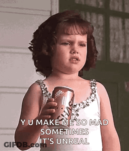 A Little Girl In A White Dress Is Holding A Can Of Soda And Making A Funny Face . GIF