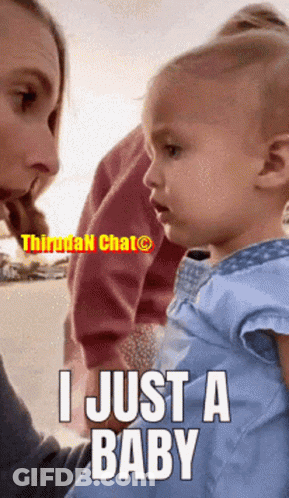 A Little Girl Is Being Held By A Woman And The Caption Says I Just A Baby GIF