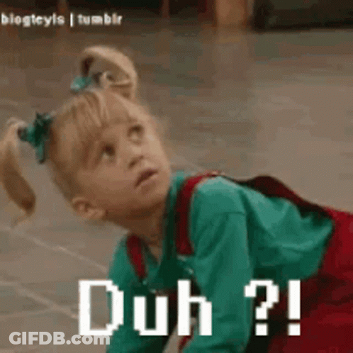 A Little Girl Is Crawling On The Floor With The Words Duh ? Written On Her Face . GIF