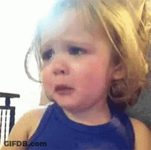 A Little Girl Is Crying And Making A Funny Face . GIF