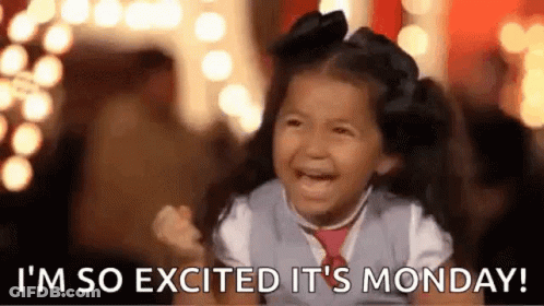 A Little Girl Is Crying And Smiling While Holding Her Fist In The Air . GIF