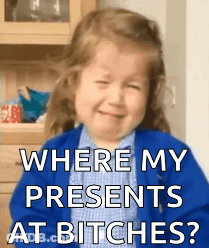 A Little Girl Is Crying With The Words " Where My Presents At Bitches " GIF
