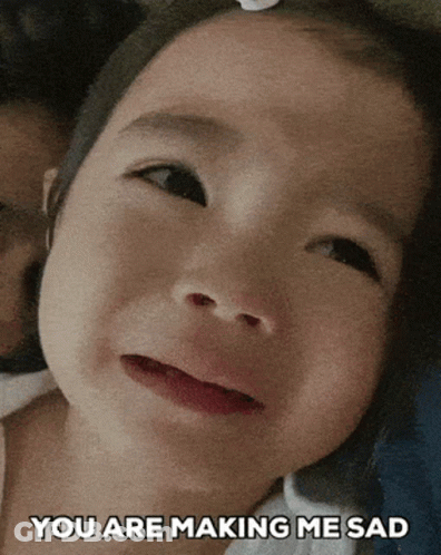 A Little Girl Is Crying With The Words " You Are Making Me Sad " On The Bottom GIF