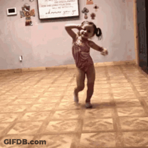 A Little Girl Is Dancing In A Dance Studio GIF