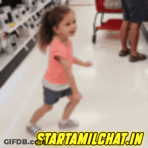 A Little Girl Is Dancing In A Store With The Words Starttamilchat.in GIF