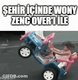 A Little Girl Is Driving A Toy Car With The Words Şehir Icinde Wony Zenc Over I Ile Written On The Bottom GIF