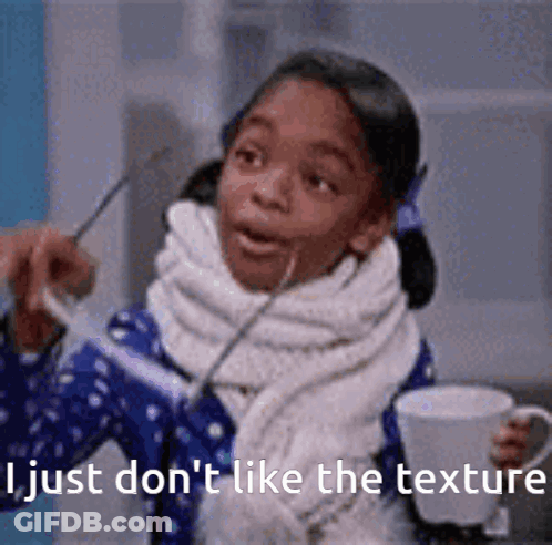 A Little Girl Is Holding A Cup Of Coffee And A Pair Of Scissors And Says I Just Don 'T Like The Texture GIF
