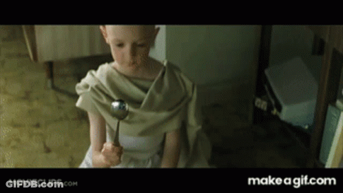 A Little Girl Is Holding A Spoon In Her Hand And The Website Says Make A Gif.com On The Bottom GIF