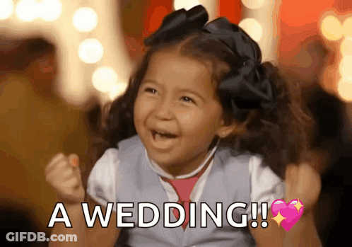 A Little Girl Is Holding Her Fist Up And Saying A Wedding . GIF