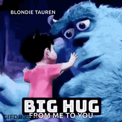 A Little Girl Is Hugging A Blue Monster From Monsters Inc GIF