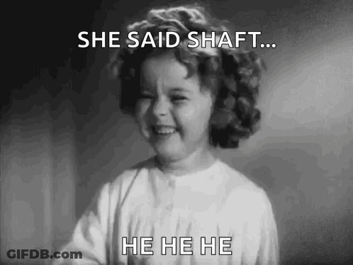 A Little Girl Is Laughing In A Black And White Photo . GIF