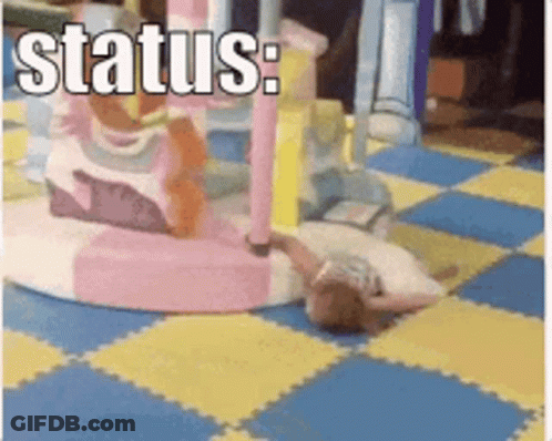 A Little Girl Is Laying On The Floor In A Playground With The Words Status Written Above Her GIF