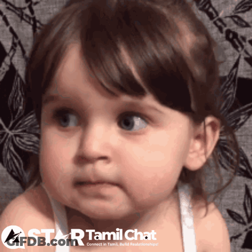 A Little Girl Is Looking At The Camera With A Star Tamil Chat Logo In The Background GIF