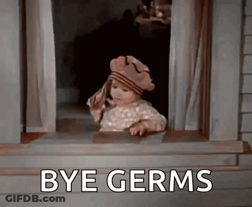 A Little Girl Is Looking Out Of A Window With The Words `` Bye Germs '' Written On It . GIF